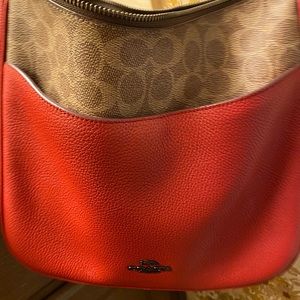 Brand new check shoulder/ cross body coach. Brand new without tag